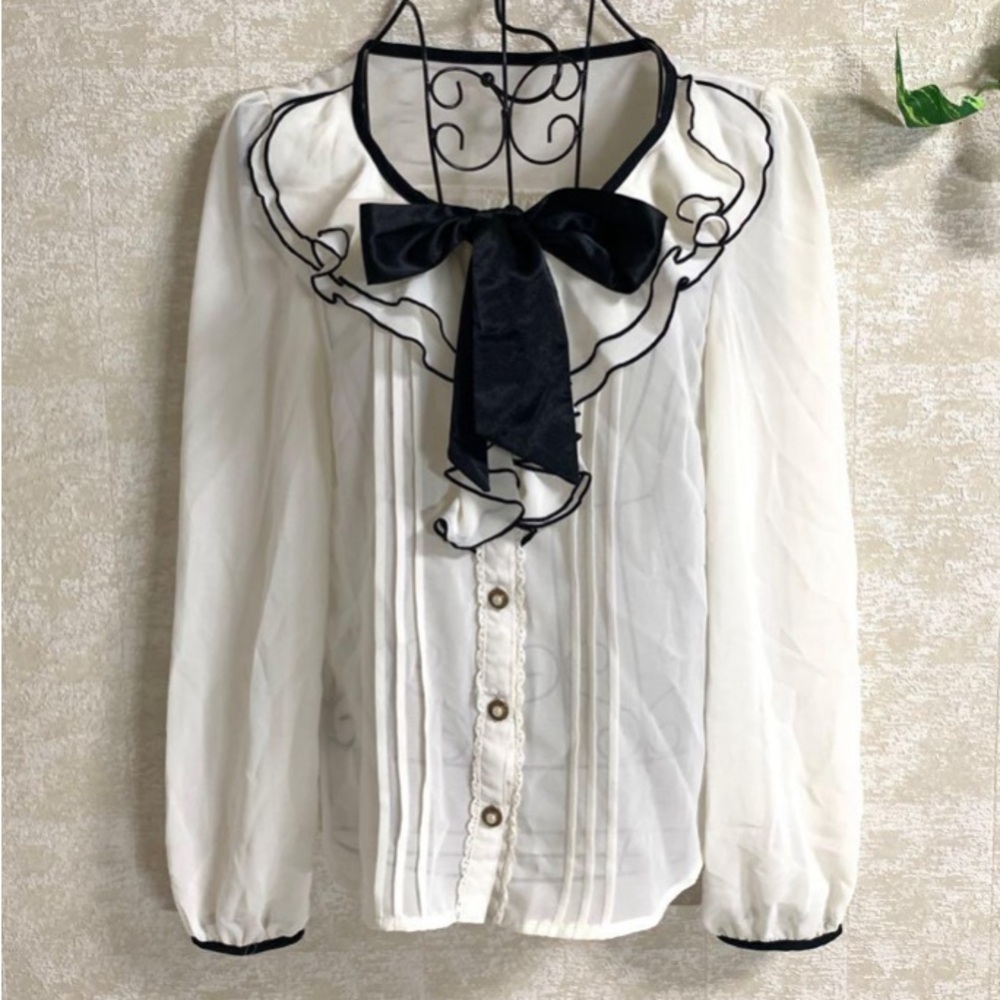 Victorian ruffle button down with bow at the neck